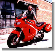 Red, so red, so sleek.... not me, the bike!